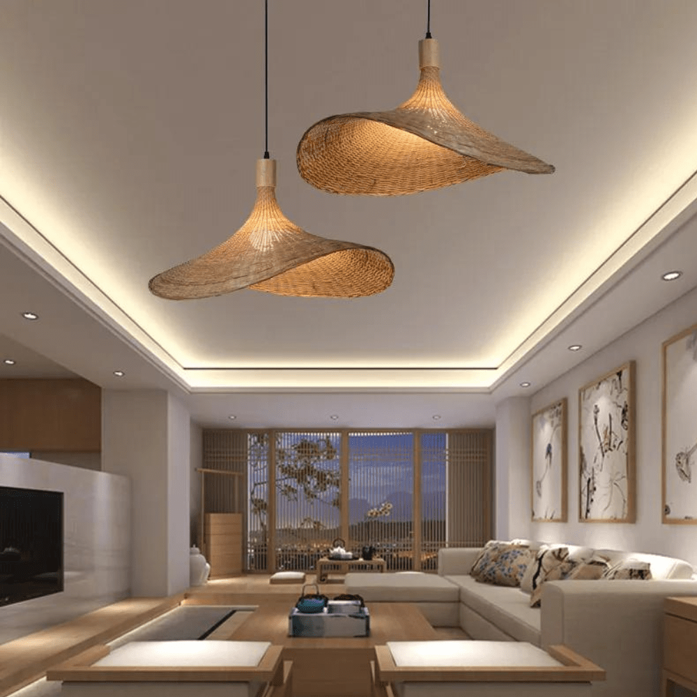 Suspension en rotin avec pendentifs en paille pour une atmosphère chaleureuse et naturelle