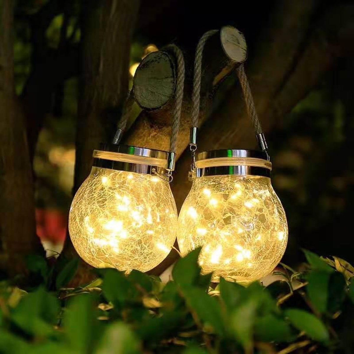 Solar powered glass lamp for gardens