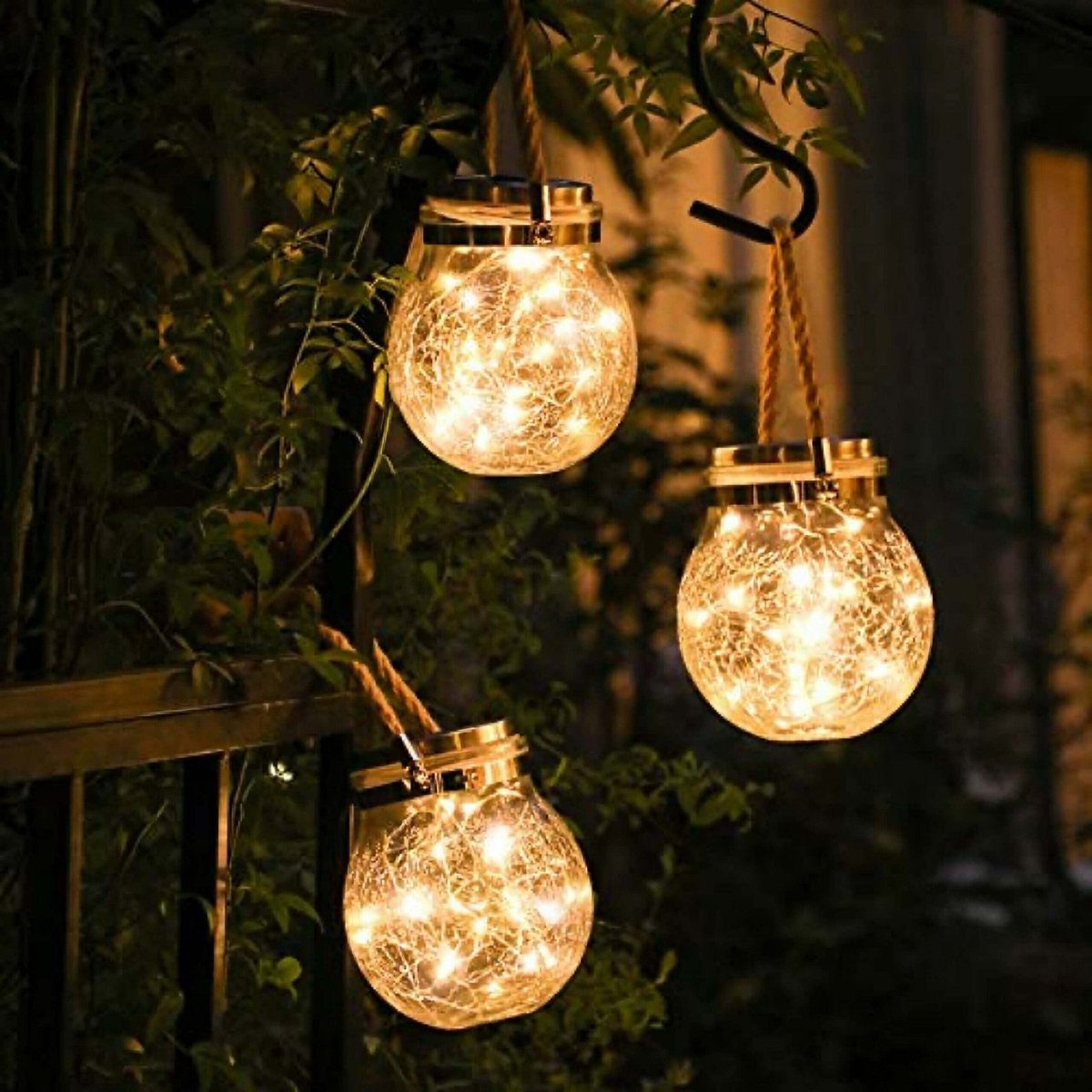 Solar powered glass lamp for gardens