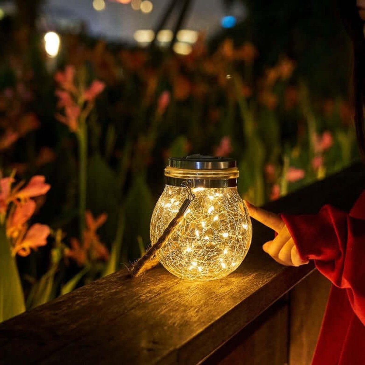 Solar powered glass lamp for gardens