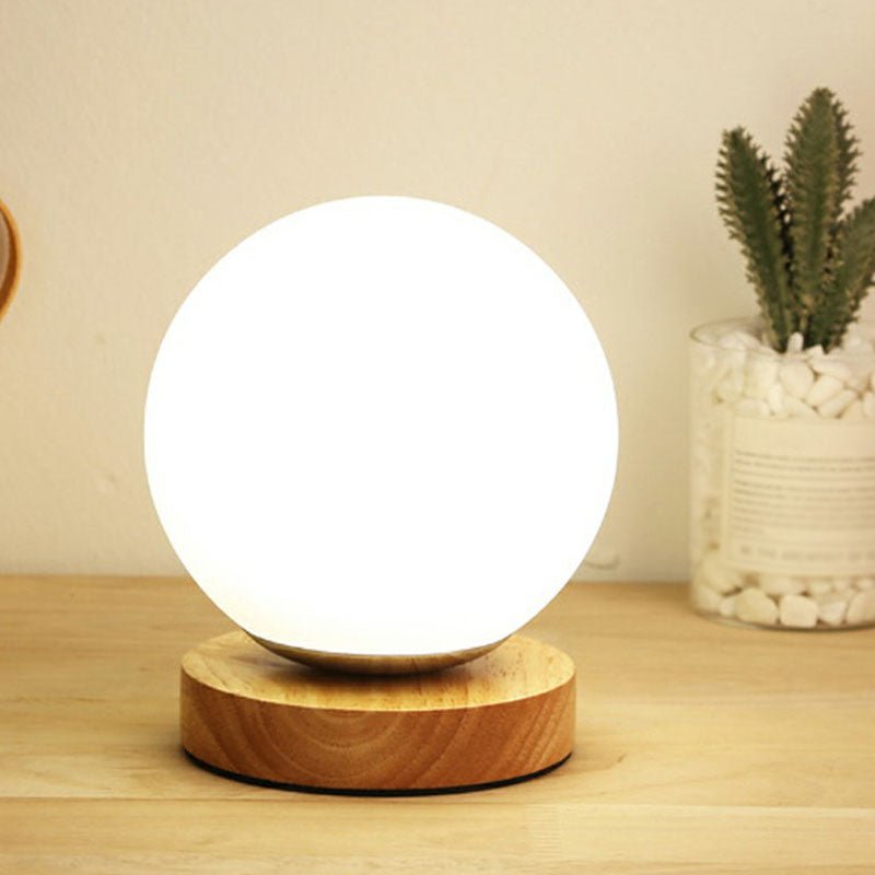 Gläserne Planeten Mini-Nachtleuchte - Postmoderne Tischlampe mit Holzfuß