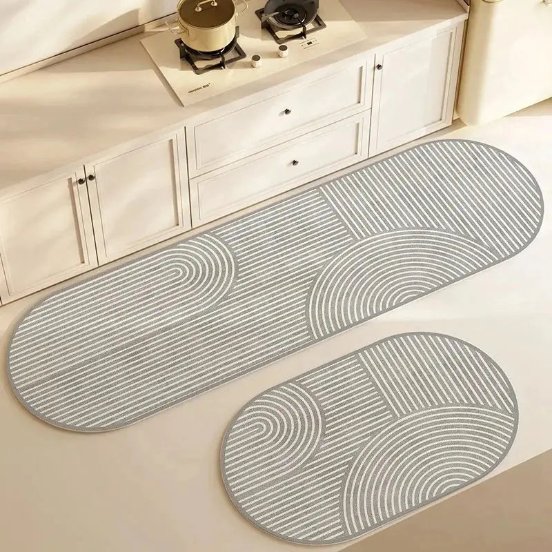 Deux tapis ovales gris super absorbant avec motifs géométriques pour une cuisine propre